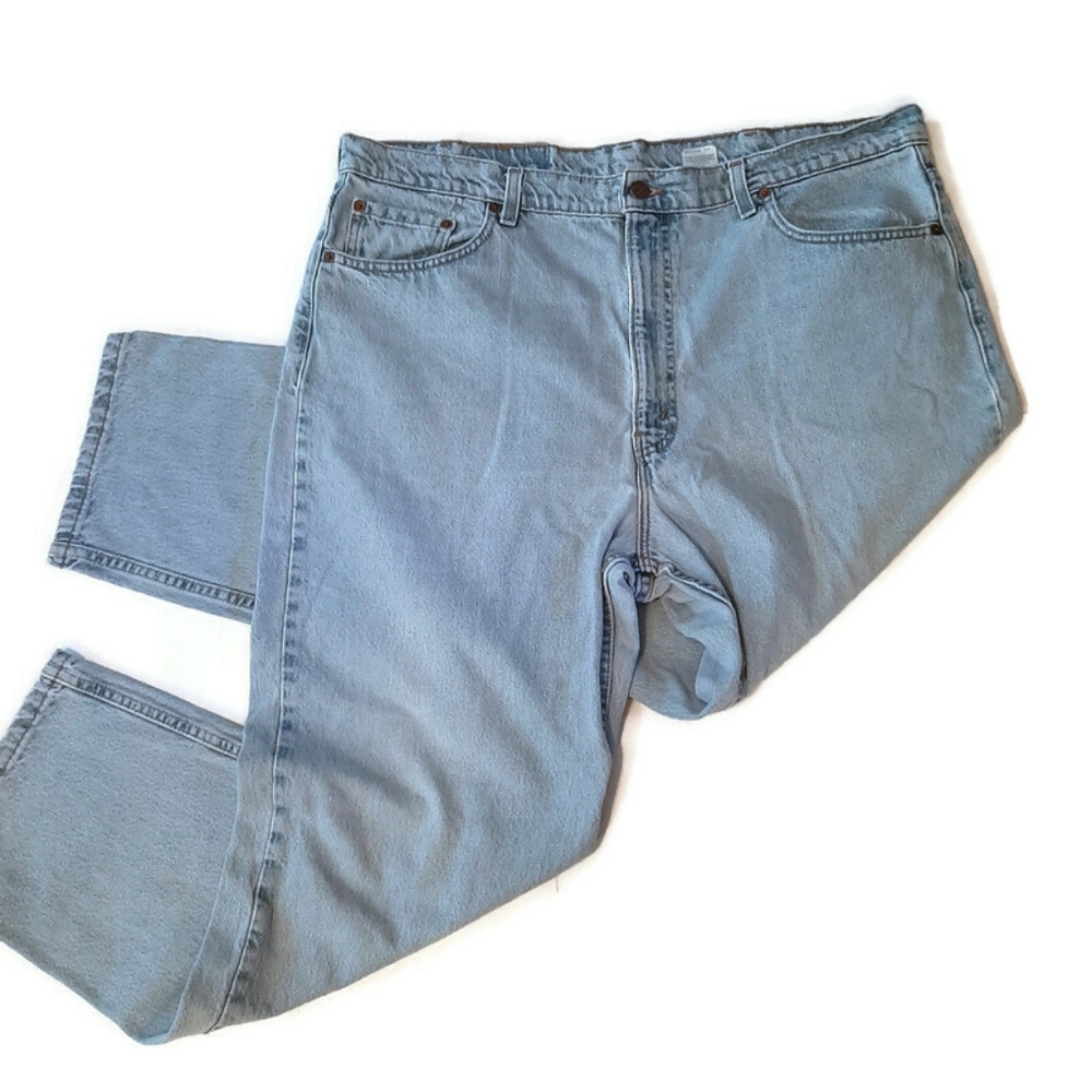 VINTAGE 90s Levi's 550 relaxed high waist light wash jeans. W42